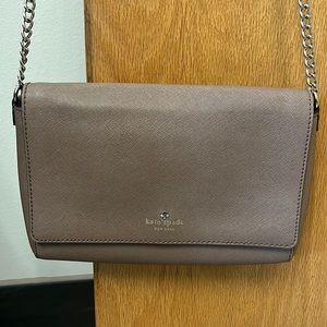 Kate Spade Tan crossbody purse. Throwing in pink wallet as well😃